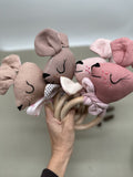 Pink doll head rattle